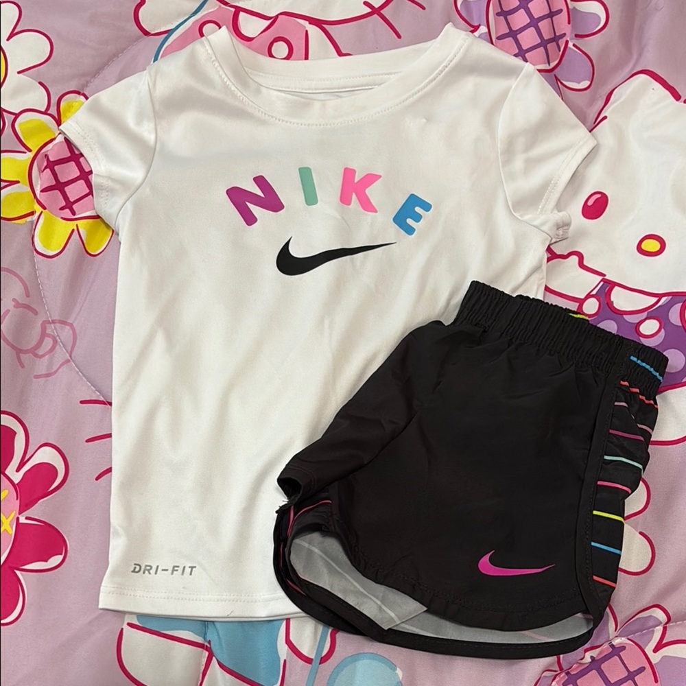 Nike White Tee with Multicolor Logo and Black Shorts